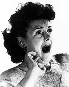 Woman gasping with terror, c 1940s.